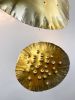 Small Universe - Kinetic Sculpture | Sculptures by Claudine Gevry Studio | Umbra & Lux in Vancouver. Item made of brass
