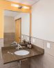 Astor Double Sconce | Sconces by ILEX Architectural Lighting | ARCH Orthodontics in Westwood. Item made of steel with glass