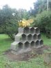 "Honeycomb with Bee" | Public Sculptures by J.A. Mayer "Sculptor" | Winnie Palmer Nature Reserve in Latrobe. Item composed of stone