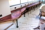 Live Edge Red Gum Wood Countertops for JSX Skyharbor lounge | Furniture by Lumberlust Designs | 2700 E Old Tower Rd in Phoenix. Item made of wood