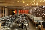E17 Chairs and Stools, Booths | Dining Chair in Chairs by Housefish | Uchi Denver in Denver. Item made of oak wood with fabric