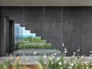 Teca House | Architecture by Federico Delrosso Architects. Item composed of wood & stone