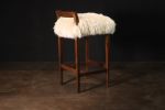 Exotic Wood Stool in Sheepskin by Costantini, Umberto | Chairs by Costantini Design. Item composed of wood and fabric