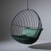 Half Circle Stand with Bubble at WMC Fair | Swing Chair in Chairs by Studio Stirling. Item made of steel works with minimalism & contemporary style