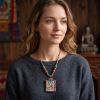 Handcrafted Medicine Buddha Thangka Amulet Pendant Art | Ornament in Decorative Objects by Dynasty Artisan. Item composed of metal in contemporary or eclectic & maximalism style