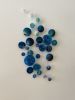 Blue/green and metallic wall art installation | Decorative Objects by Wall Art Object by Betti Brillembourg