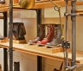 Perimeter Shelving System | Storage by Amuneal | Cole Haan in New York. Item composed of wood and metal