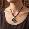 Handcrafted Green Tara Thangka Gold Pendant Amulet Jewelry | Ornament in Decorative Objects by Dynasty Artisan. Item made of metal works with contemporary & eclectic & maximalism style