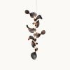 Dune 8 Vertical Cluster in Metallic Tones Pendant Light | Chandeliers by MOSS Objects. Item composed of metal compatible with contemporary and japandi style