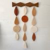 Ceramic wall hanging with decorative wood design | Wall Sculpture in Wall Hangings by Heidi Anderson HASTUDIO. Item composed of wood and ceramic