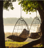 Studio Stirling Nest Eggs at Chikwenya Camp in Zimbabwe | Swing Chair in Chairs by Studio Stirling. Item made of steel works with minimalism & coastal style