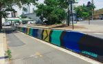 BARRIER BEAUTIFICATION | Street Murals by LAMKAT. Item made of synthetic