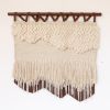 Tindall | Tapestry in Wall Hangings by Keyaiira | leather + fiber | Dr. Michael Cantwell MD in San Francisco. Item composed of walnut & fiber