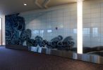 Interval | Public Mosaics by Barbara Cooper | TF Green Airport (Arrivals), Warwick, RI in Warwick. Item composed of ceramic
