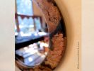 Eye-Catching Round Cherry Burl Wall Mirror - 30” | Decorative Objects by thomas weber. Item composed of wood and glass in boho or country & farmhouse style