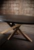 Oval Black Oak Dining Table, Criss Cross Golden Base | Tables by NO AGE FURNITURE STUDIO. Item composed of oak wood