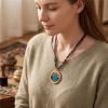 Handcrafted Green Tara Thangka Gold Pendant Amulet Jewelry | Ornament in Decorative Objects by Dynasty Artisan. Item made of metal works with contemporary & eclectic & maximalism style