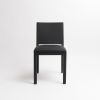 om5.1 Upholstered black ash contemporary Chair. SET OF 2 | Dining Chair in Chairs by mjiila design furniture. Item composed of wood and fabric in minimalism or contemporary style