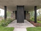 Teca House | Architecture by Federico Delrosso Architects. Item composed of wood & stone