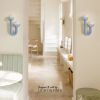 Baby Blue Sculptured Sconces with Glass bubbles | Sconces by Light and Fiber. Item made of steel with glass works with mid century modern & contemporary style