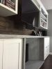 Cement and wood fireplace wall | Fireplaces by Kula Solutions. Item composed of wood and cement
