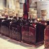 Custom Negroni Decanters | Vessels & Containers by Reclamation Etchworks | The Slanted Door San Ramon in San Ramon. Item composed of glass