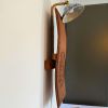 Suspended Moment — Wall Sculptural Lamp with Republic-Era Po | Sconces by Loom&Drift. Item made of wood & ceramic compatible with minimalism and mid century modern style