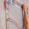 "Pocket" | Embroidery in Wall Hangings by ANTLRE - Hannah Sitzer | Google RWC SEA6 in Redwood City. Item made of fabric