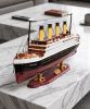 40" Museum-Grade Titanic Wood Model w/ LED & Display Case | Sculptures by Dynasty Artisan. Item made of wood with copper works with eclectic & maximalism & traditional style