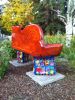 Kitty Bench with Venus Fly Traps and Begonias | Benches & Ottomans by Rachel Kaiser Art. Item composed of wood