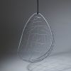 Studio Stirling Nest Eggs at Chikwenya Camp in Zimbabwe | Swing Chair in Chairs by Studio Stirling. Item made of steel works with minimalism & coastal style