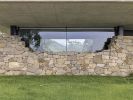Teca House | Architecture by Federico Delrosso Architects. Item composed of wood & stone