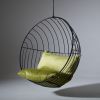 Half Circle Stand with Bubble at WMC Fair | Swing Chair in Chairs by Studio Stirling. Item made of steel works with minimalism & contemporary style
