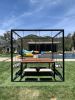 Kevin Hart's Black 8-Seater SwingTable Teak | Picnic Table in Tables by SwingTables | Kevin Hart's Home in Calabasas. Item composed of wood and steel
