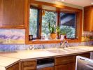 Rocky Mountain Front Kitchen Backsplash | Sculptures by Rachel Kaiser Art. Item composed of cement
