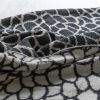 Peel Reversible Throw | Smoke/milk | Linens & Bedding by Jill Malek Wallpaper. Item made of cotton