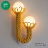 Divine Yellow Duo lamp with glass lamp shades | Sconces by Light and Fiber. Item composed of steel and glass in mid century modern or contemporary style