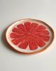 Pink Grapefruit Platter 27 cm | Serveware by Federica Massimi Ceramics. Item composed of ceramic in eclectic & maximalism or mediterranean style