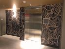 Leaf Pattern Wallcovering | Prints by Organik Creative | The McAdams Apartments in Houston. Item made of metal