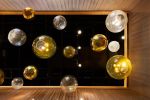 Bubble | Chandeliers by Illuminata Art Glass Design by Julie Conway | Din Tai Fung in Bellevue. Item made of brass & glass