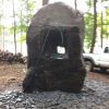 Window to the Past | Public Sculptures by Rock and A Soft Place Studios | Crystal Park 協和山莊 in Holmes. Item composed of stone