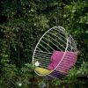 Bubble Hanging Swing Chair - Pink and Green Cushions | Chairs by Studio Stirling | Ten Stirling Bed and Breakfast in Johannesburg. Item made of steel works with minimalism & modern style