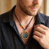 Handcrafted Green Tara Thangka Mineral Art Pendant | Ornament in Decorative Objects by Dynasty Artisan. Item composed of metal in contemporary or eclectic & maximalism style