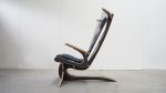 Hippokamp Lounge Chair & Footstool - Fabric | Chairs by Peter Qvist. Item made of birch wood with fabric works with minimalism & contemporary style