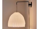 Industrial sconce with pleated dome lampshade, | Sconces by Studio Pleat. Item composed of metal & paper compatible with mid century modern and contemporary style