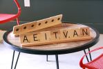 Scrabble Board | Sculptures by Organik Creative | Alexan West Dallas in Dallas. Item made of wood & metal