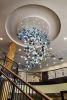 L’eau de Vie | Chandeliers by April Wagner, epiphany studios | The Inn At Harbor Shores in Saint Joseph. Item composed of glass