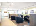 Custom Lobby Furniture (Sofas, Chairs, Tables) | Armchair in Chairs by Greg Sheres | Clippership Apartments on the Wharf in Boston. Item composed of fabric