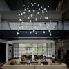Voyage Cluster Asymmetrical Pendant Chandelier with 62 Light | Pendants by Galilee Lighting. Item made of metal with glass works with minimalism & modern style
