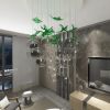 Vigneto Glass Globes Chandelier with Green Murano Leaves | Pendants by Galilee Lighting. Item composed of metal & glass compatible with modern style